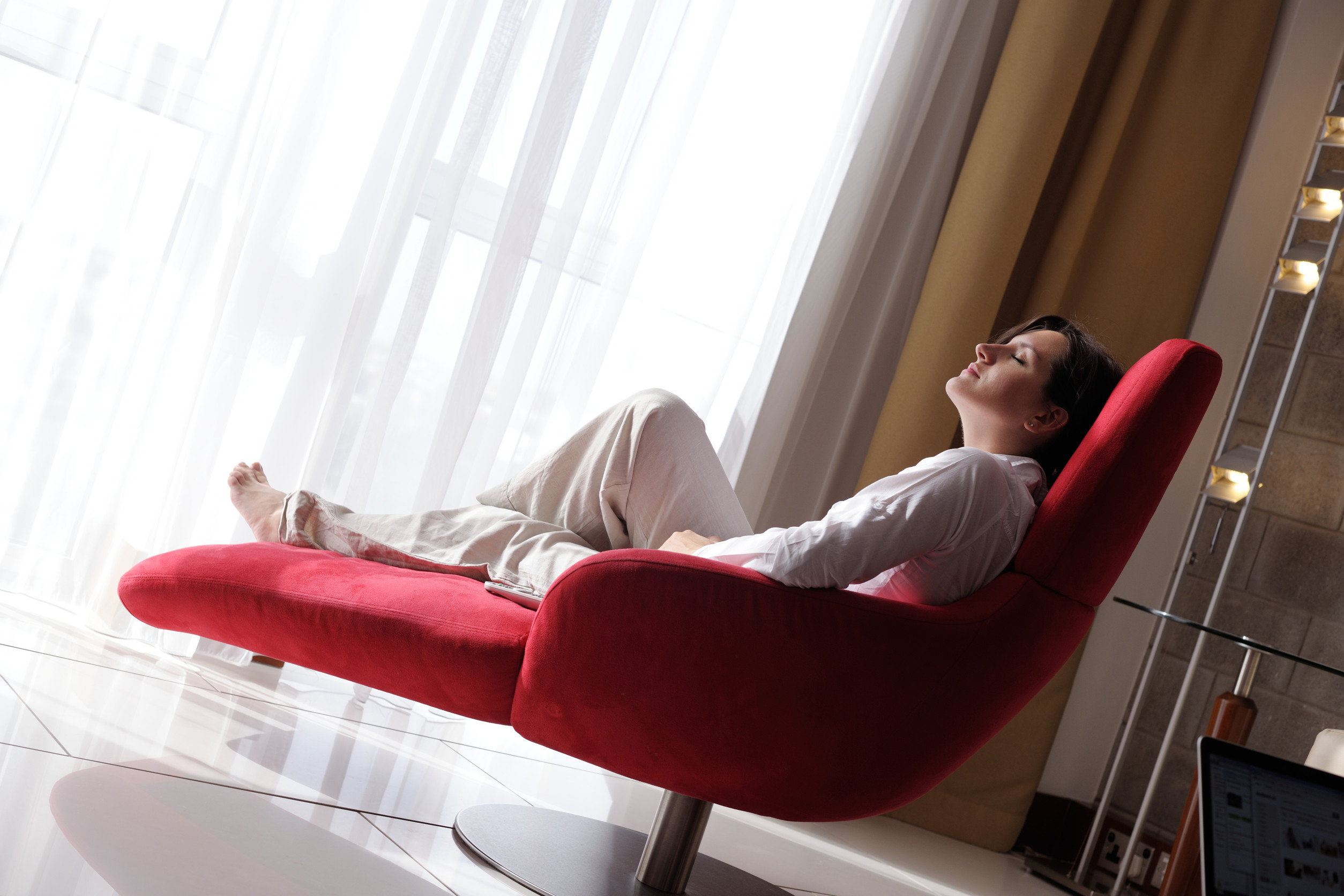 woman using a laptop computer at home